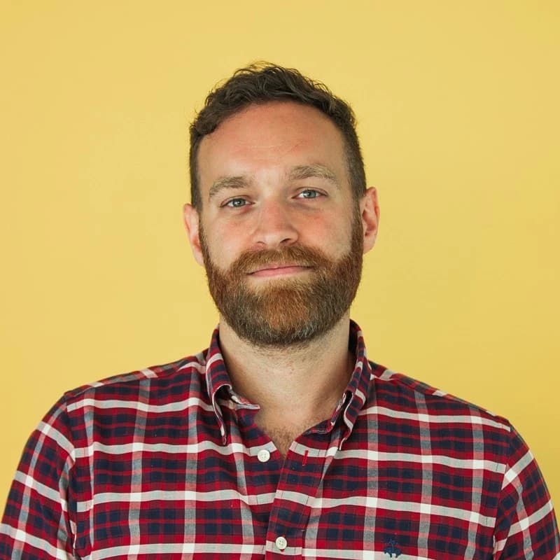 A pixel art avatar of Theodore Belo